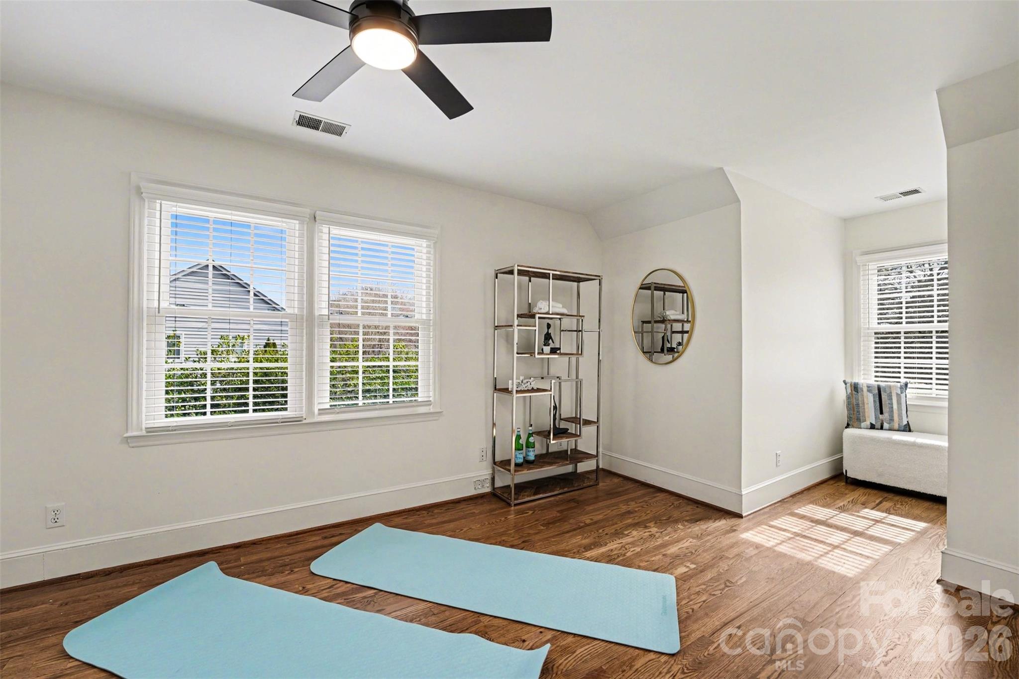 5606 Hillingdon Road Charlotte, NC 28226 - Photo 30 of 41 a bedroom with a bed and a window