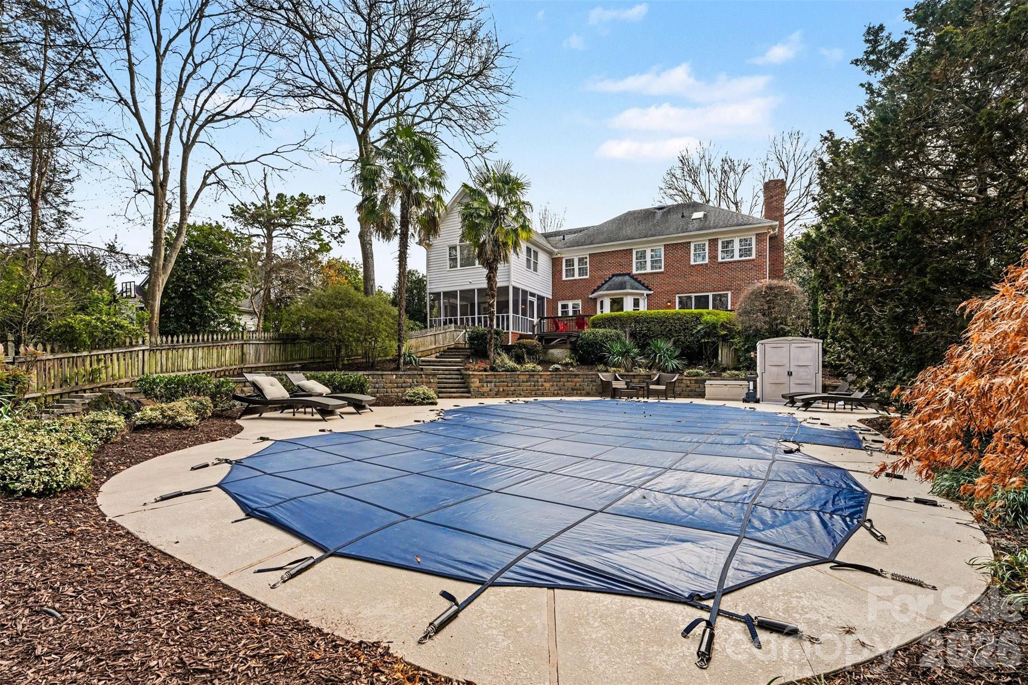 5606 Hillingdon Road Charlotte, NC 28226 - Photo 37 of 41 a view of a house with backyard and sitting area
