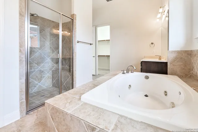 an empty room with a empty space and a ceiling fan