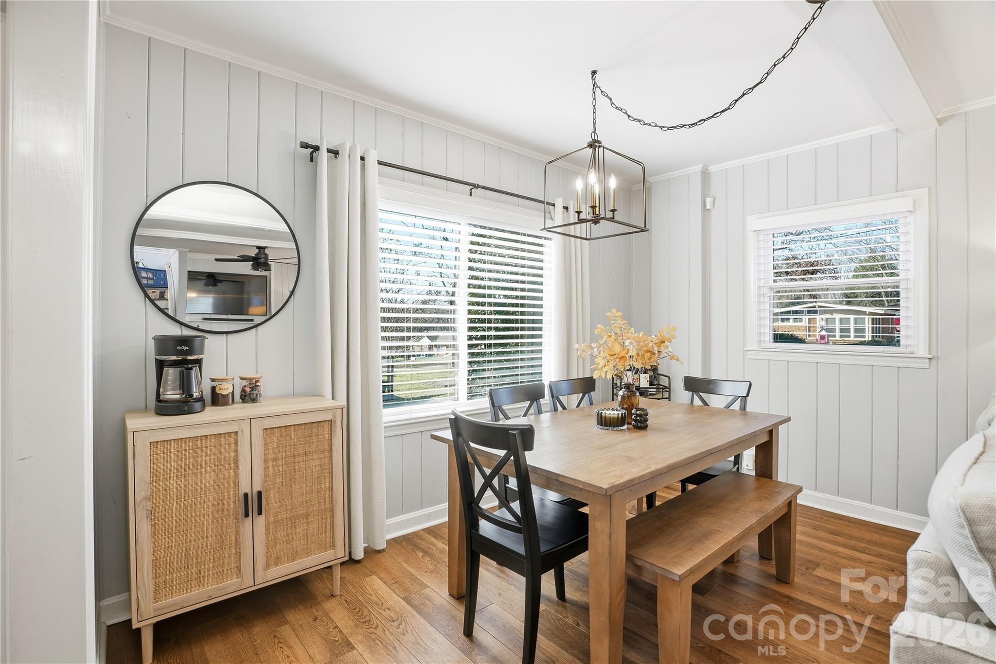 6409 Montpelier Road Charlotte, NC 28210 - Photo 24 of 46 a view of a dining room with furniture window and wooden floor
