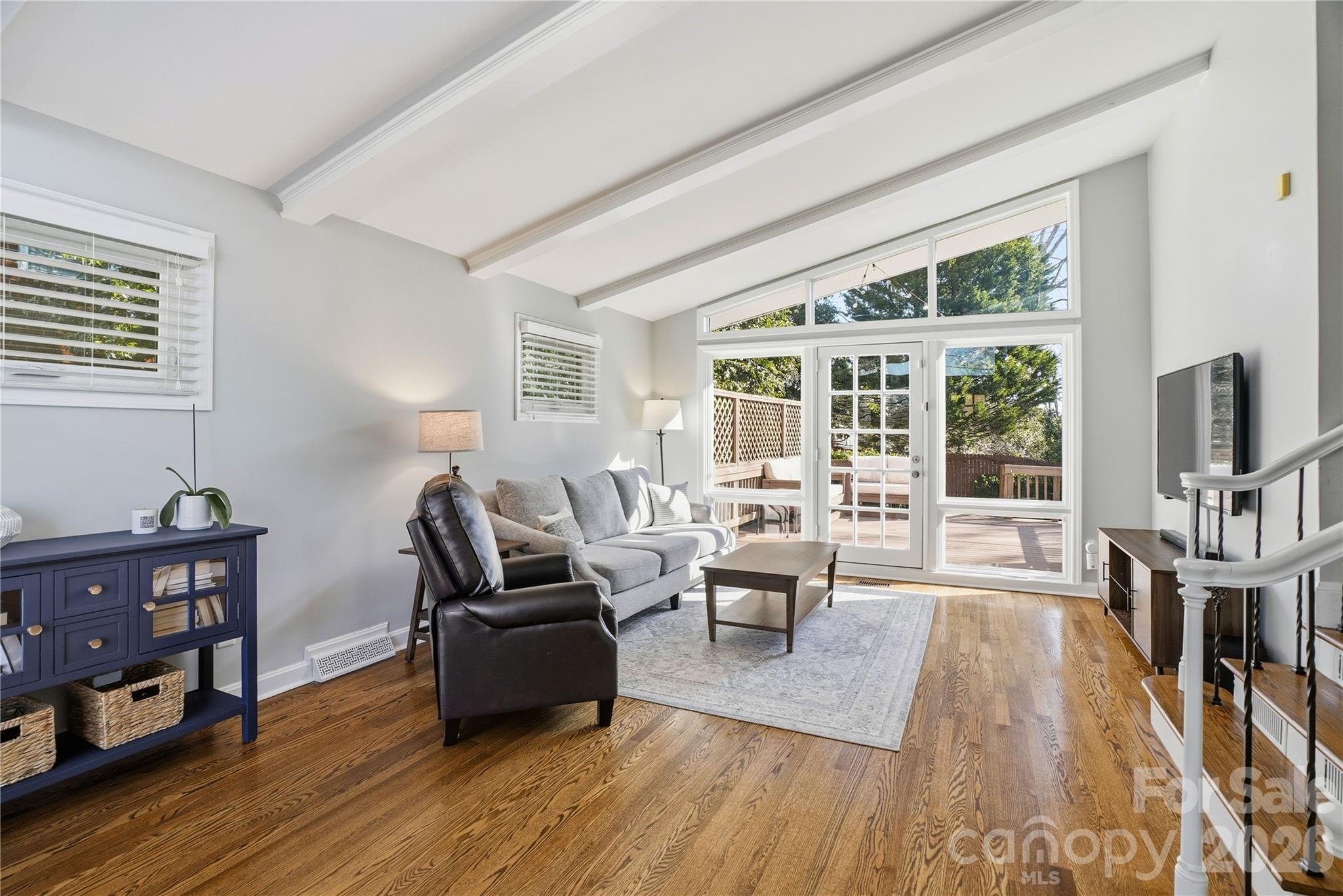 6409 Montpelier Road Charlotte, NC 28210 - Photo 4 of 46 a living room with furniture and a wooden floor