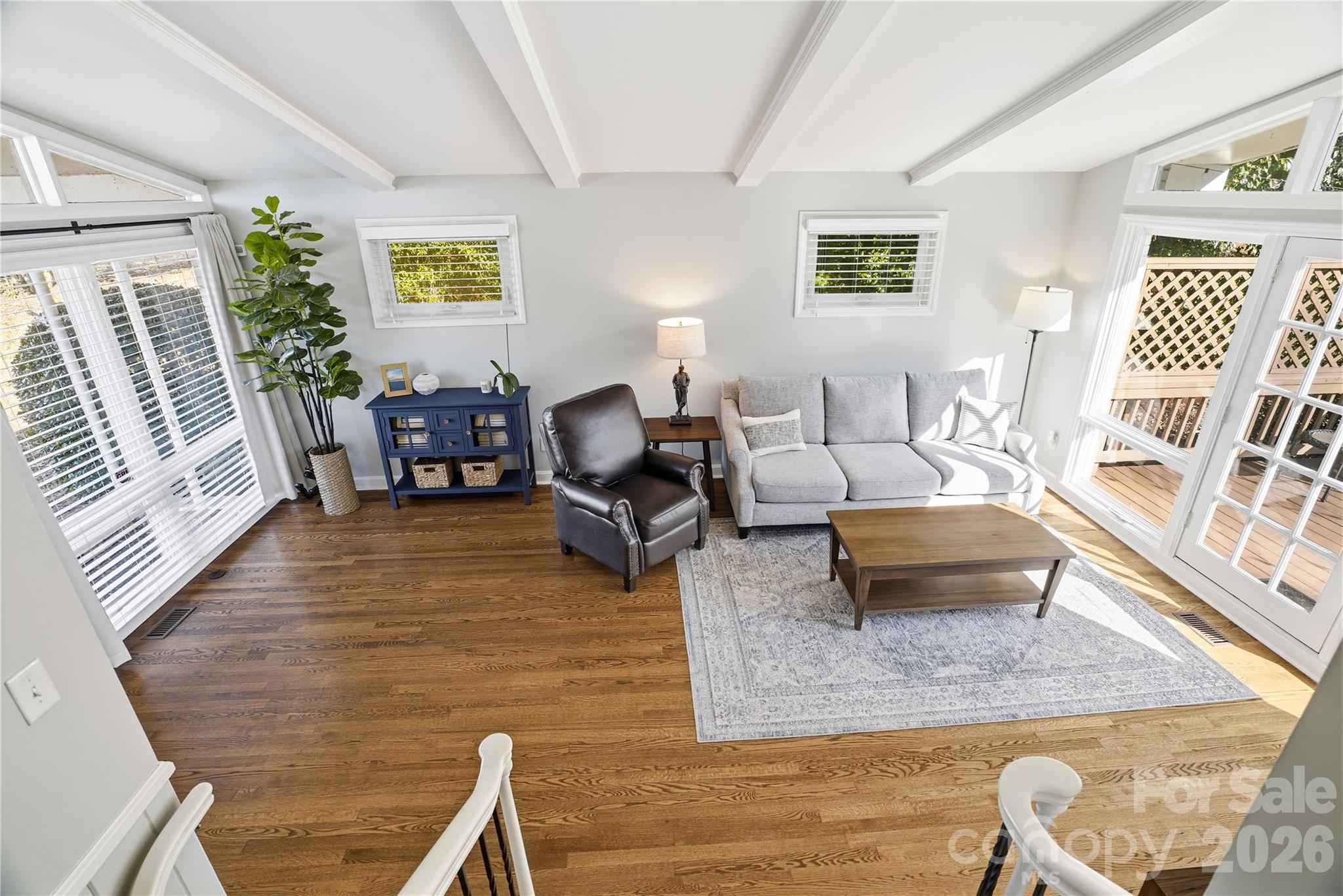 6409 Montpelier Road Charlotte, NC 28210 - Photo 6 of 46 a living room with furniture rug and window