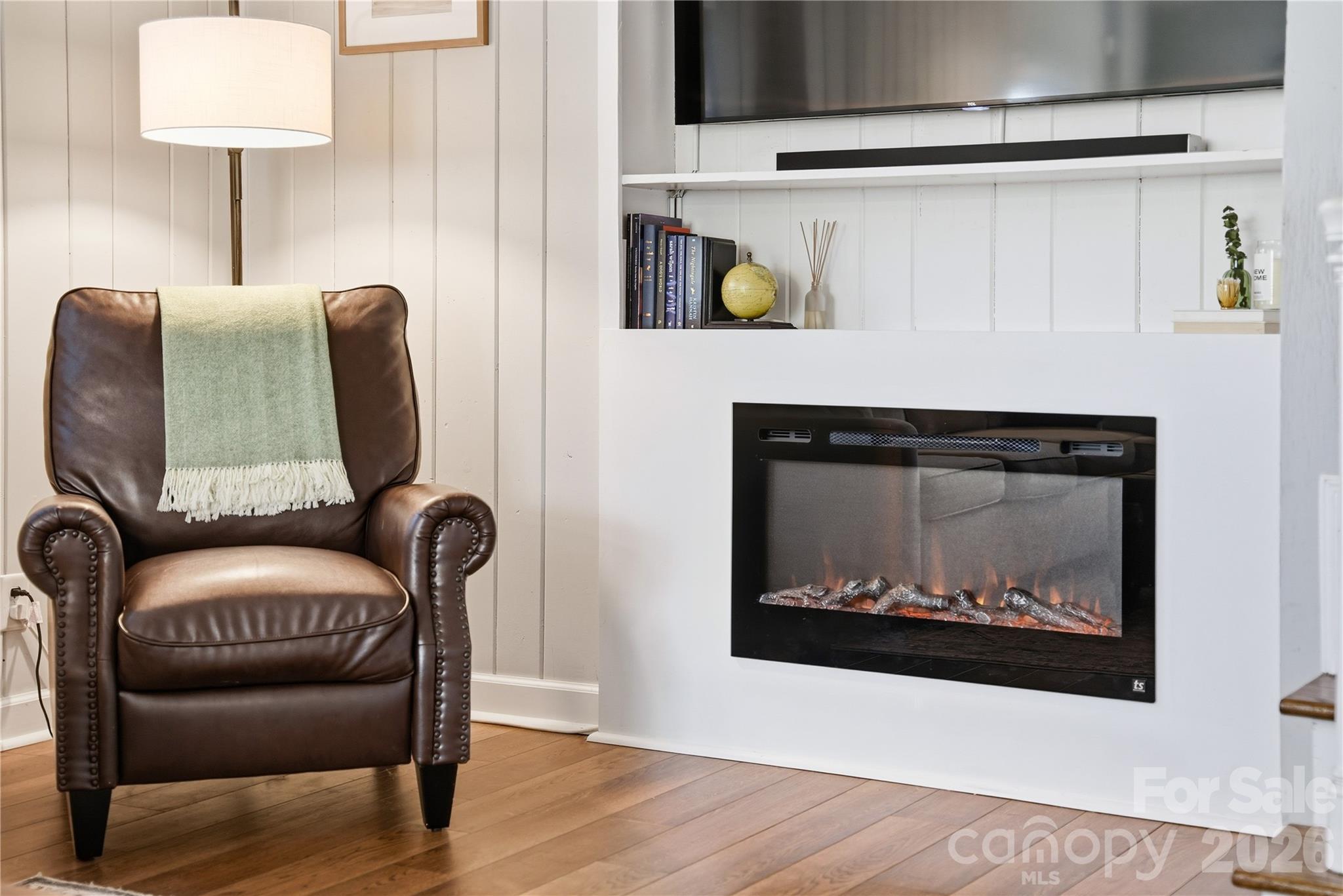 6409 Montpelier Road Charlotte, NC 28210 - Photo 10 of 46 a living room with furniture and a fireplace