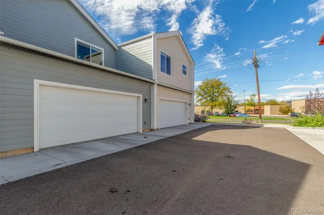 a view of a house with a street