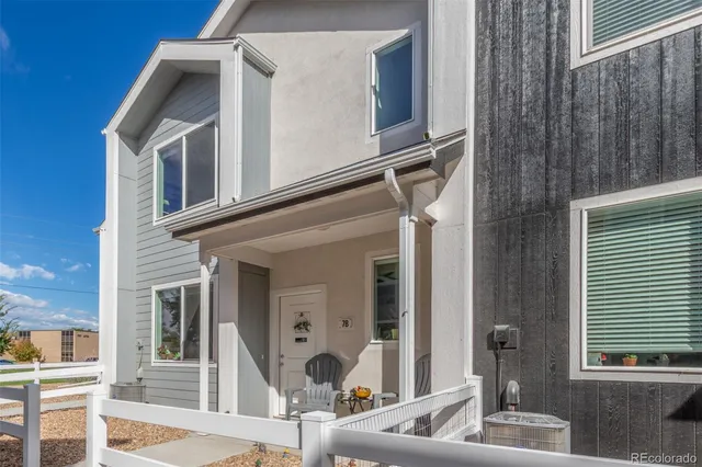 a front view of a house with a porch