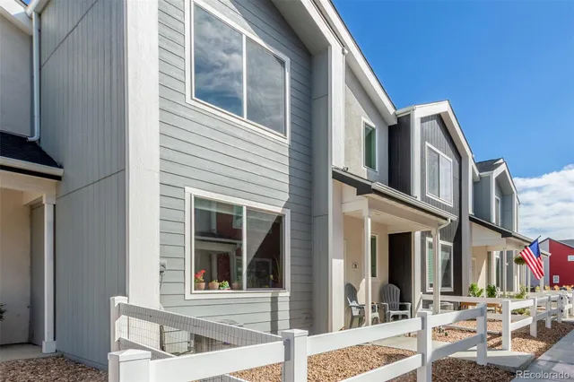 a front view of a house with street