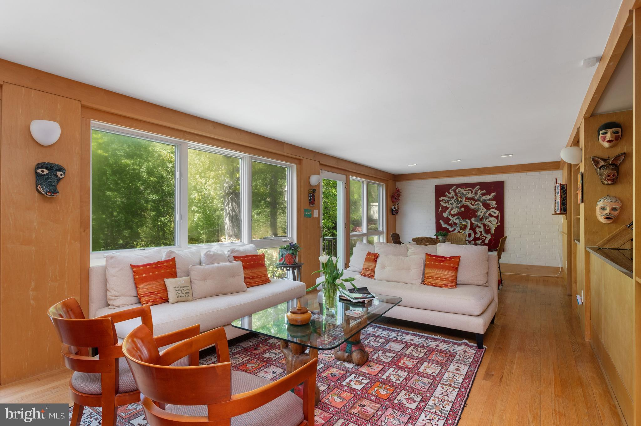 5344 Falmouth Road Bethesda, MD 20816 - Photo 8 of 25 a living room with furniture and a large window
