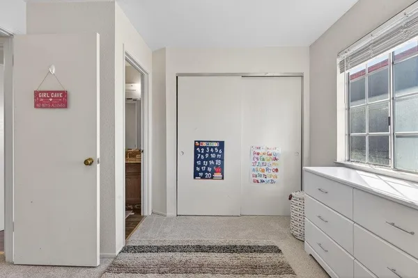 a bathroom with a granite countertop sink toilet bathtub and shower