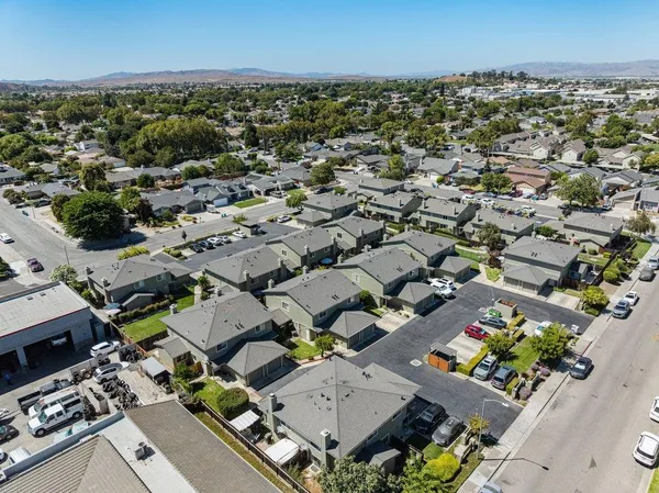 an aerial view of a city with lots of residential buildings