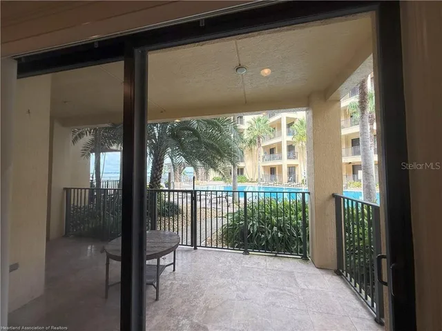 a kitchen with granite countertop kitchen island a sink appliances and a counter space