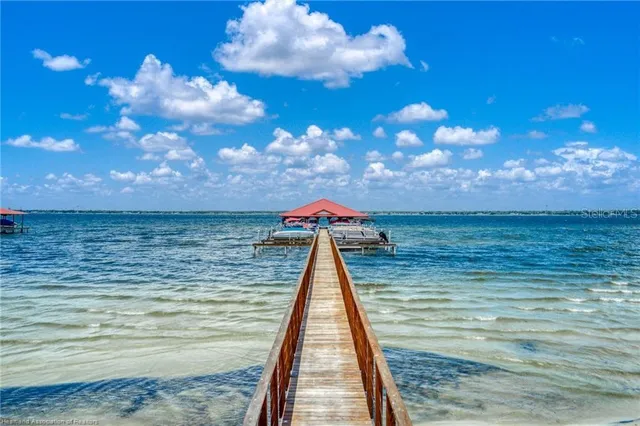 a view of a lake with sitting area