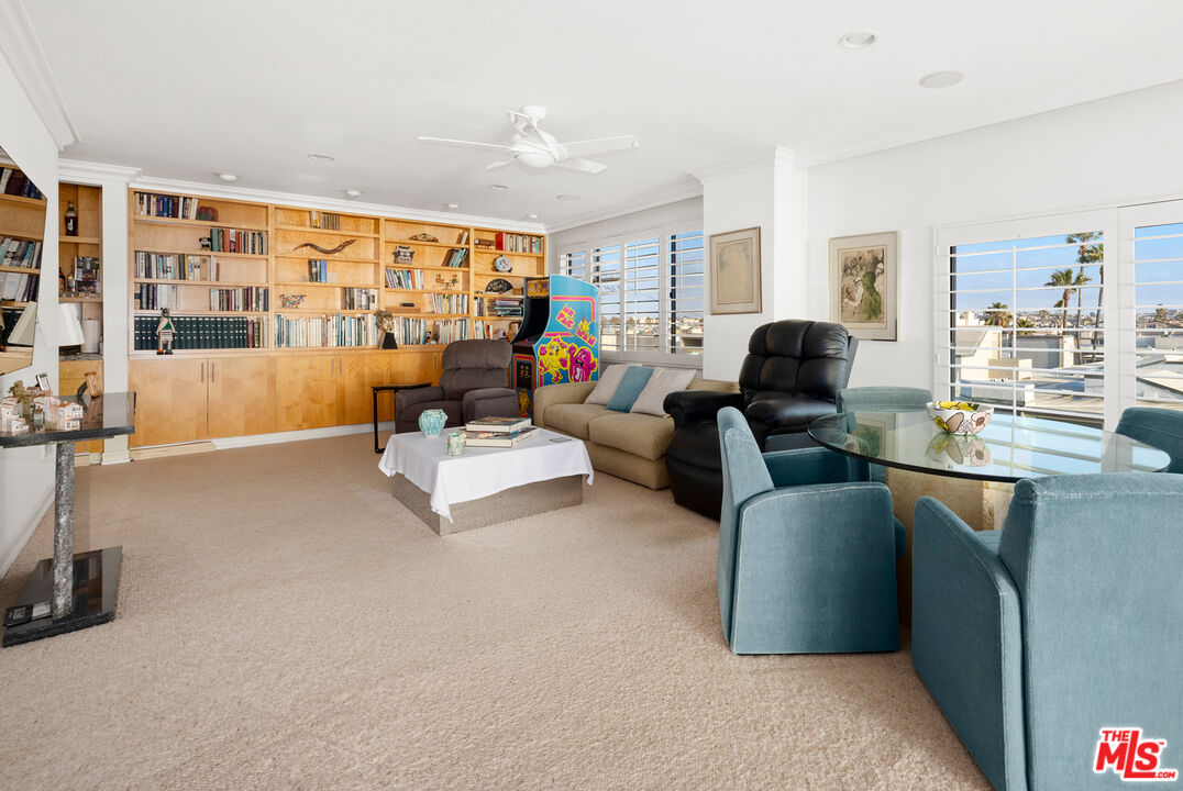 1 Northstar Street, Unit PH1 Marina del Rey, CA 90292 - Photo 8 of 18 a living room with furniture and a large window