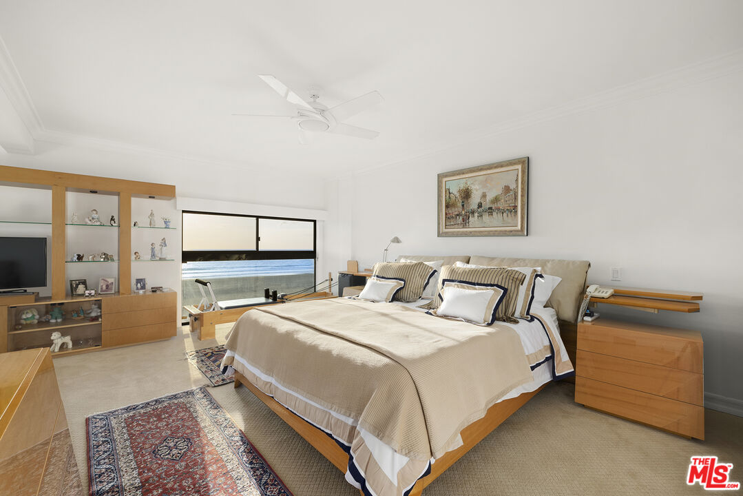 1 Northstar Street, Unit PH1 Marina del Rey, CA 90292 - Photo 9 of 18 a bedroom with a bed and wooden floor