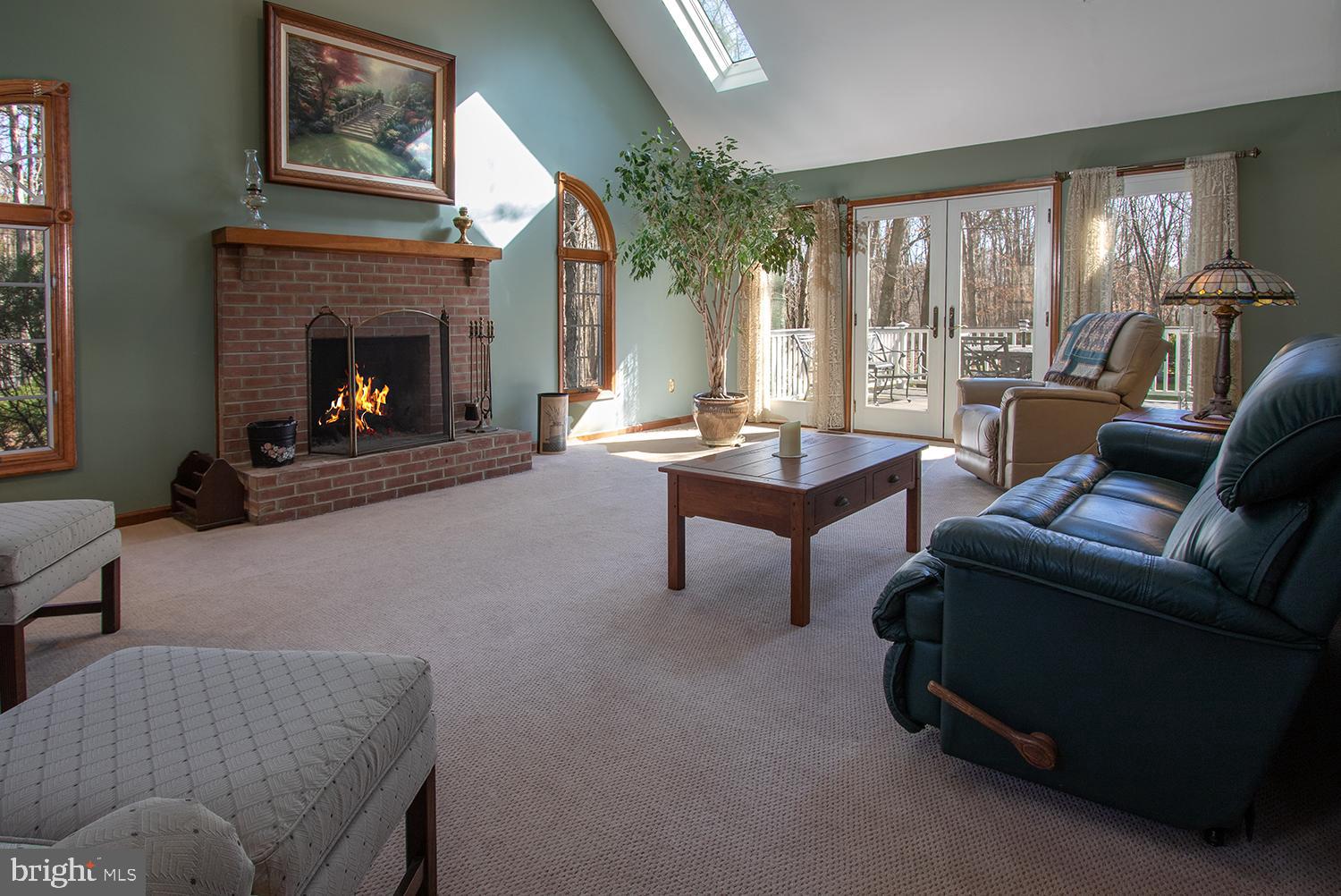 6 Arncliffe Rise Medford, NJ 08055 - Photo 5 of 29 Great room with wood burning fireplace, sky lights