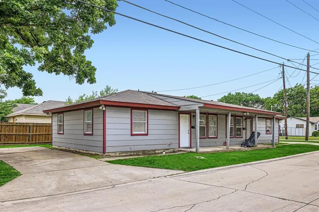 a view of a house with a garden