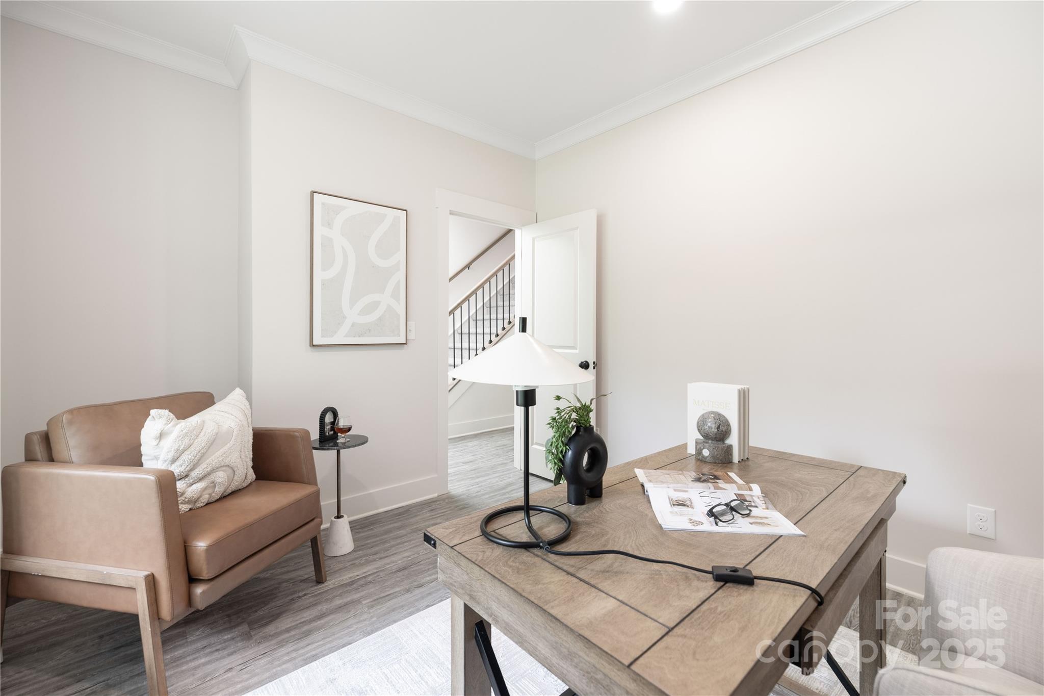 8937 Penstemons Drive Charlotte, NC 28215 - Photo 5 of 31 a living room with furniture and wooden floor