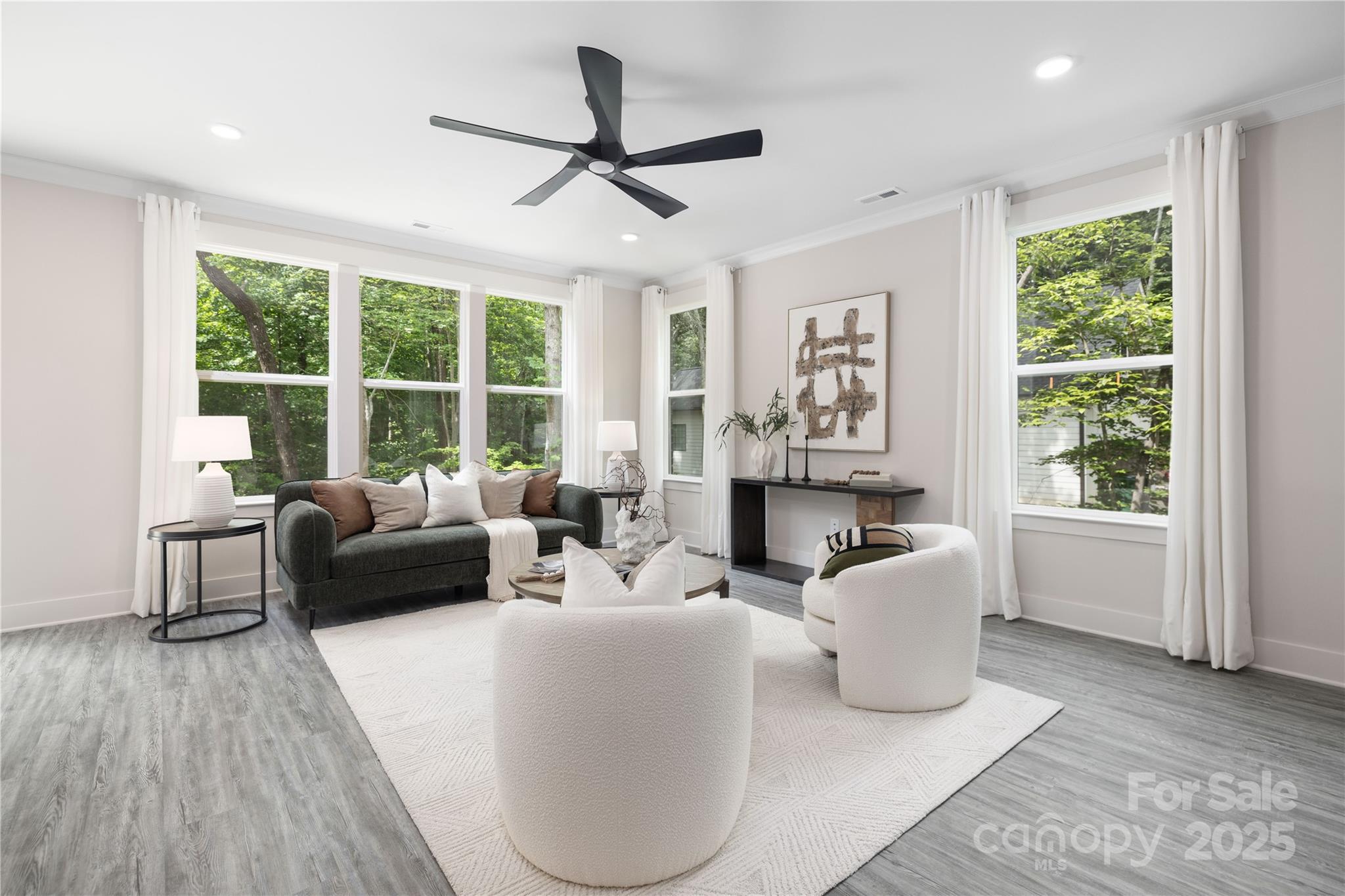 8937 Penstemons Drive Charlotte, NC 28215 - Photo 8 of 31 a living room with furniture and a large window