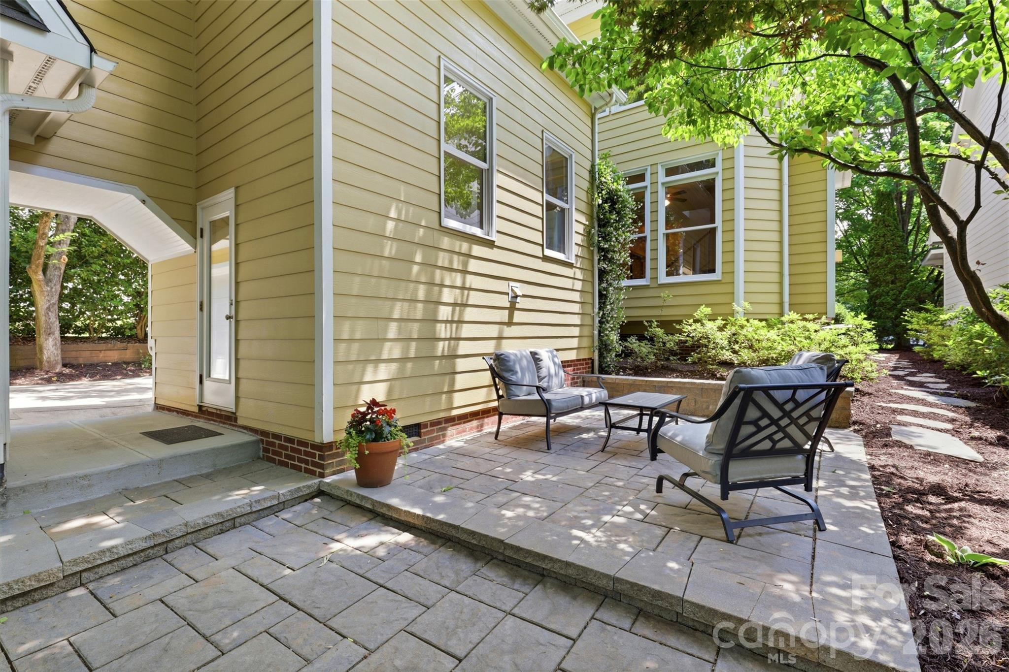 739 Julia Street Fort Mill, SC 29708 - Photo 34 of 48 a view of a house with backyard and sitting area