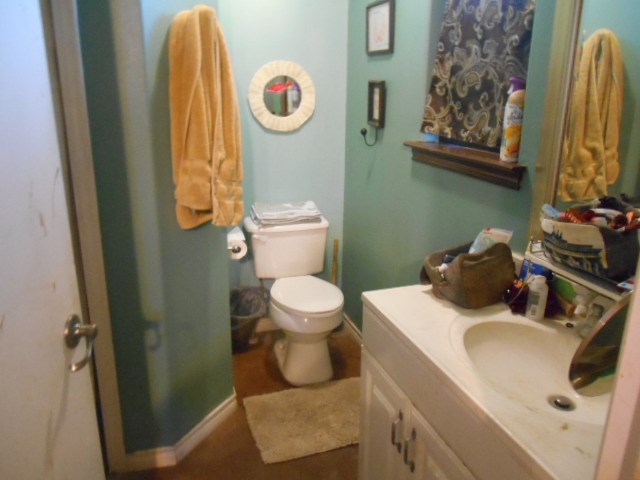 1207 Loving Street Mason, TX 76856 - Photo 8 of 10 a bathroom with a sink and a mirror