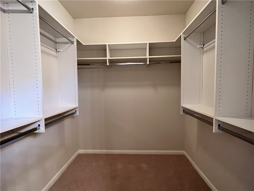 167 Whispering Wind Drive Georgetown, TX 78633 - Photo 12 of 29 Master closet (the only carpet in the whole house)