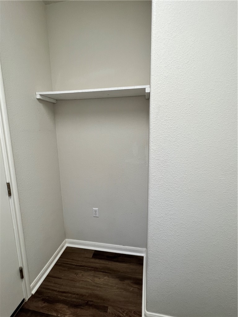 167 Whispering Wind Drive Georgetown, TX 78633 - Photo 18 of 29 Alcove space in utility room with 110v outlet. Add a 2nd fridge, freezer, bench or add a utility shelf unit for more storage.