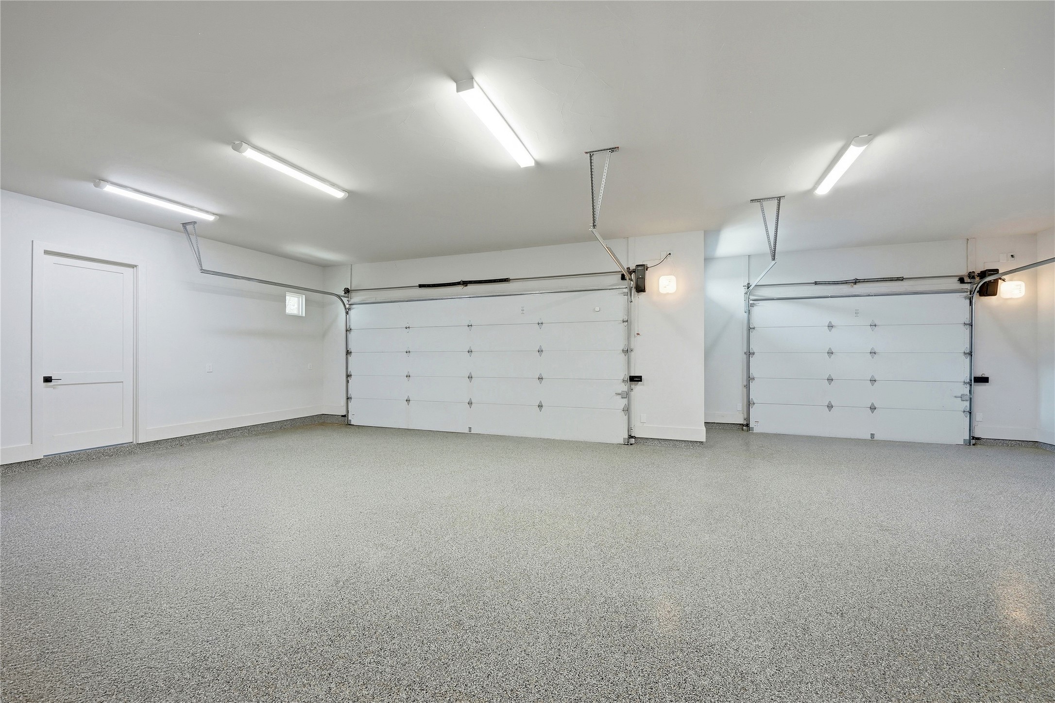 449 Ranch Falls Fair Oaks Ranch, TX 78015 - Photo 39 of 39 Gleaming epoxy floors and overhead lighting define this clean, spacious garage.