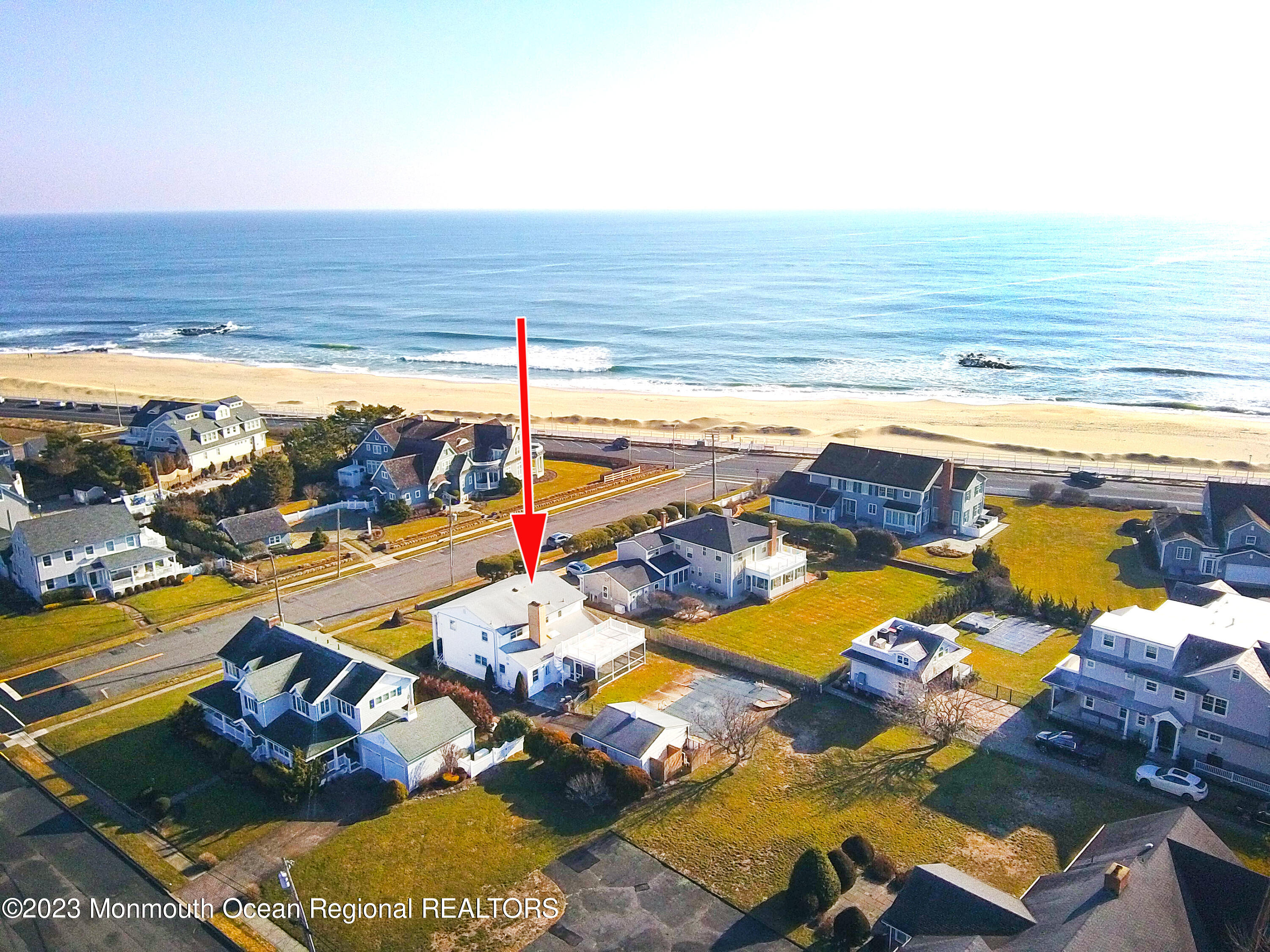 7 Howell Avenue Spring Lake, NJ 07762 - Photo 37 of 52 a view of an ocean and a beach