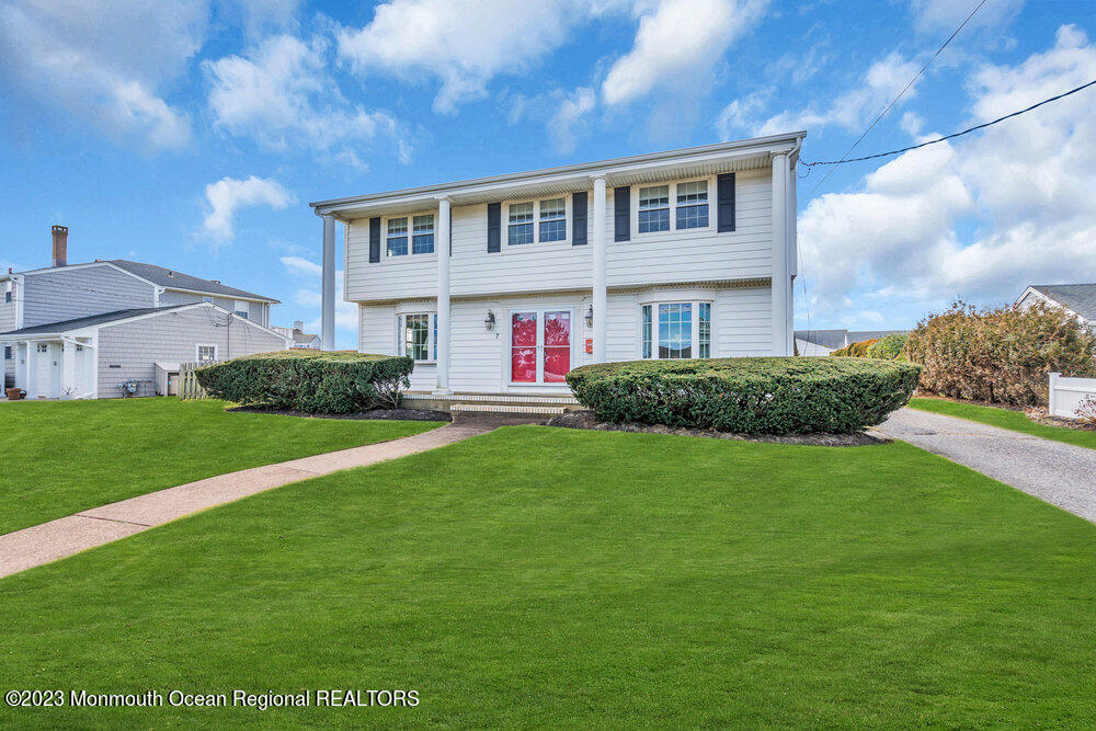 7 Howell Avenue Spring Lake, NJ 07762 - Photo 5 of 52 a front view of house with yard and green space