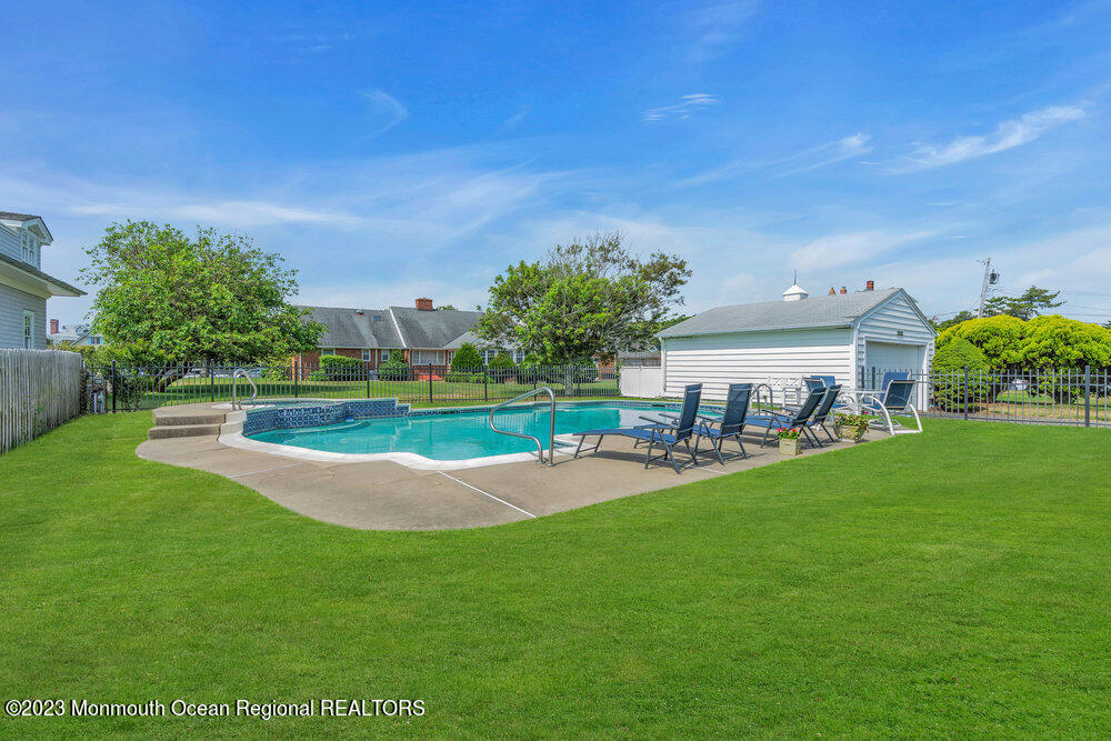 7 Howell Avenue Spring Lake, NJ 07762 - Photo 51 of 52 a view of a house with a backyard porch and sitting area