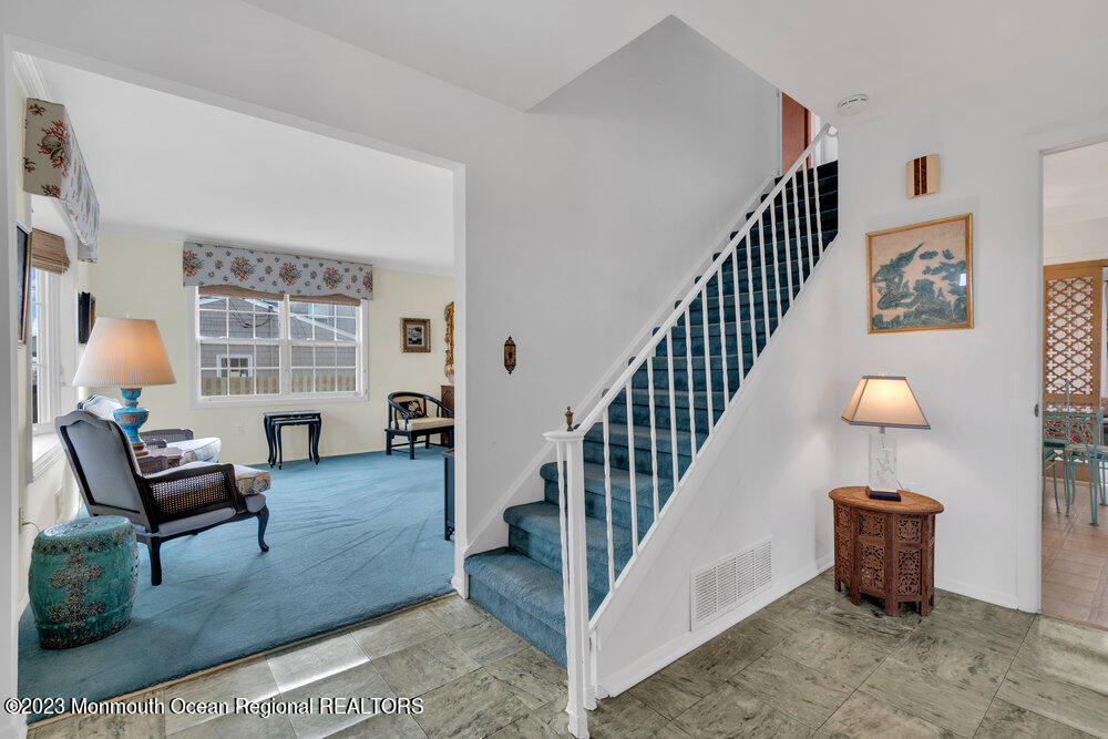 7 Howell Avenue Spring Lake, NJ 07762 - Photo 7 of 52 a living room with furniture and a window