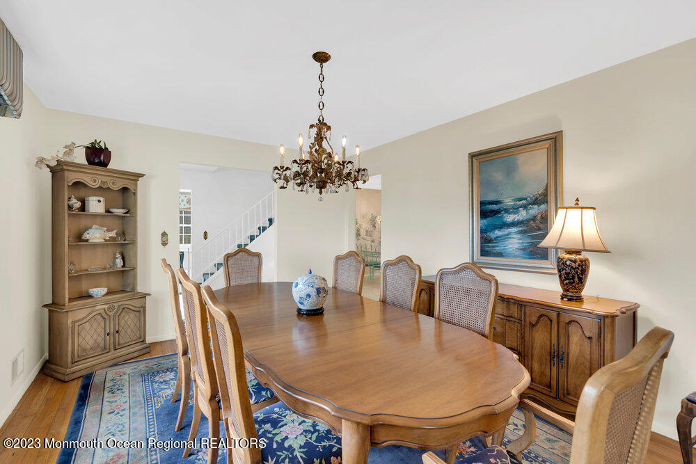 7 Howell Avenue Spring Lake, NJ 07762 - Photo 8 of 52 a view of a dining room with furniture and wooden floor