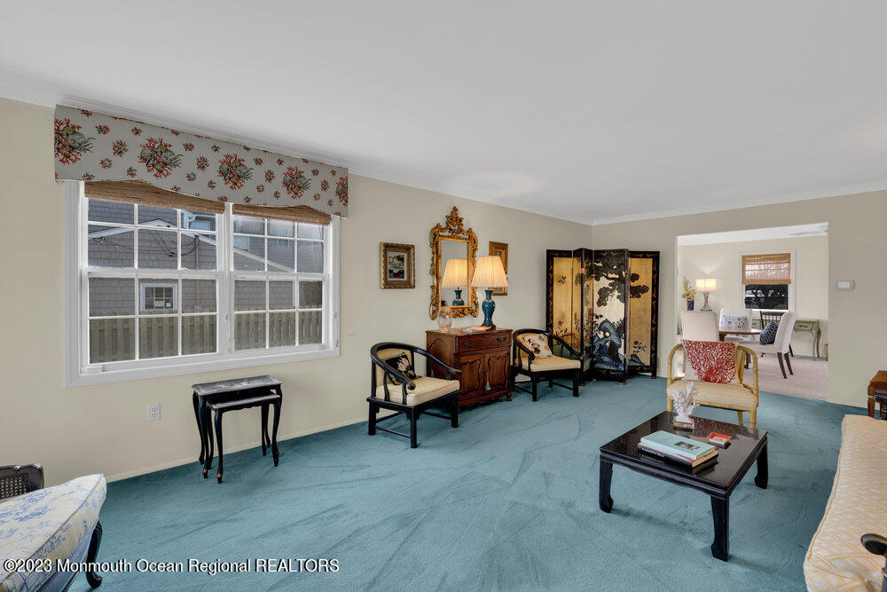7 Howell Avenue Spring Lake, NJ 07762 - Photo 10 of 52 a living room with furniture and a window