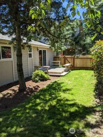 a kitchen with a refrigerator and a sink
