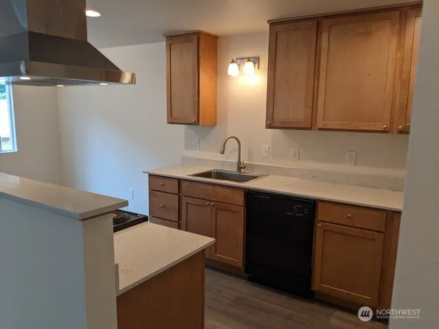 a picture of a bathroom with a shower curtain
