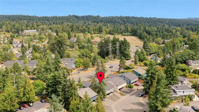 a picture of a bathroom with a shower curtain