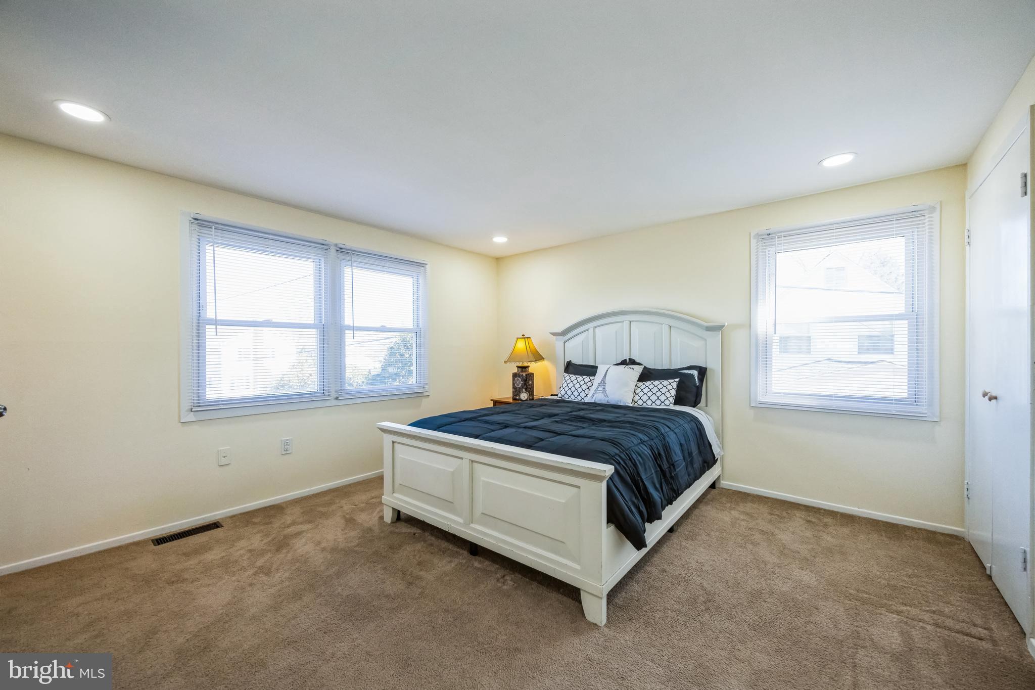 59 Manor Lane Willingboro, NJ 08046 - Photo 17 of 28 a bedroom with a bed and window