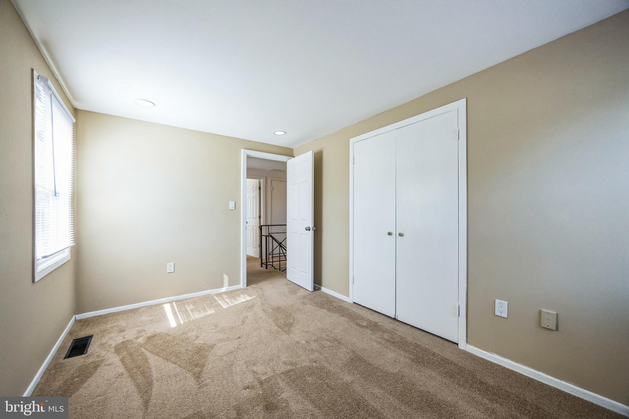 59 Manor Lane Willingboro, NJ 08046 - Photo 20 of 28 a view of an empty room and window
