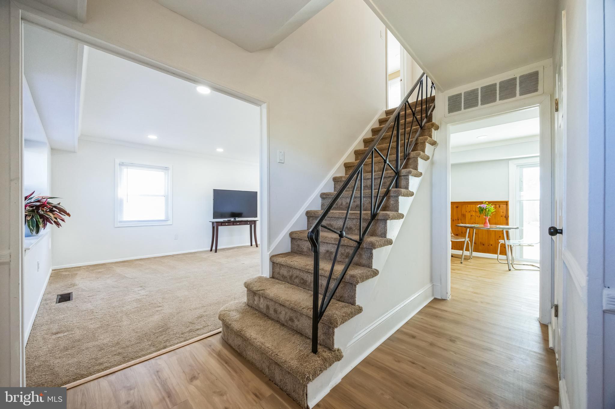 59 Manor Lane Willingboro, NJ 08046 - Photo 3 of 28 a view of entryway and hall with wooden floor
