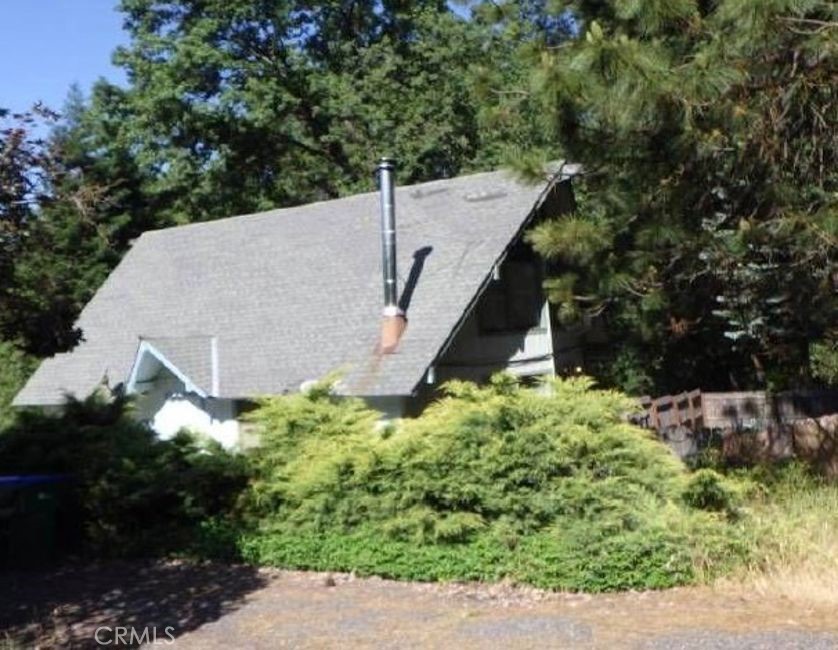 22036 Crystal Falls Drive Sonora, CA 95370 - Photo 2 of 4 a aerial view of a house with a yard and plants