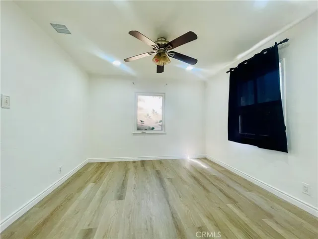 a kitchen with a sink cabinets and stainless steel appliances