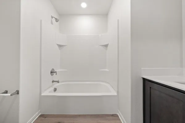 a bathroom with a bathtub
