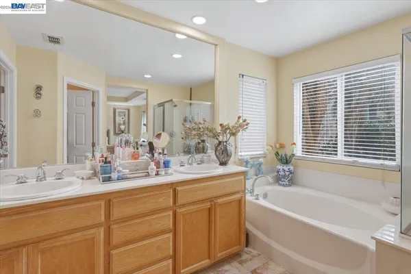 a utility room with a sink dryer and washer