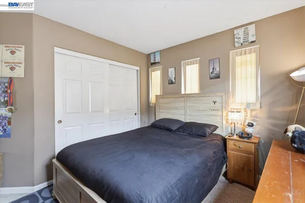 a bathroom with a shower a sink and a mirror