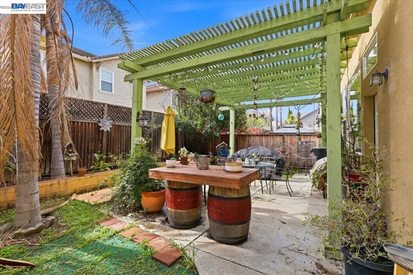 a view of a park with bench and trees