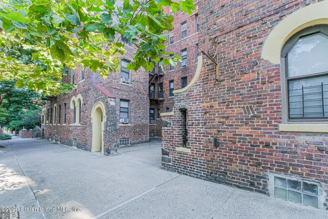 a view of entrance gate of a house