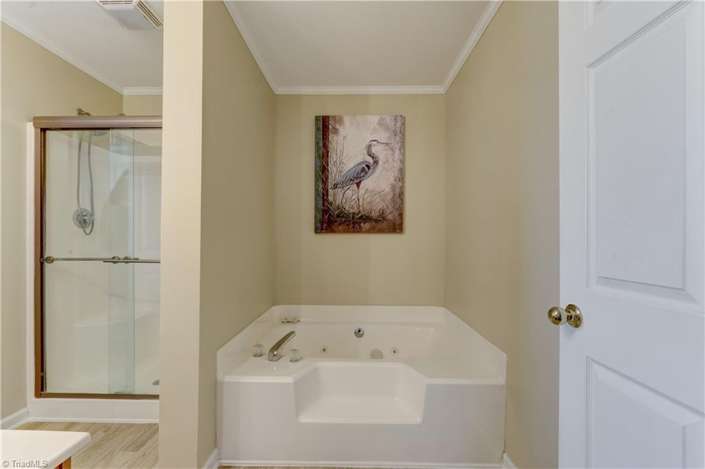 6010 Sandy Creek Church Road Staley, NC 27355 - Photo 15 of 38 Owner's bath