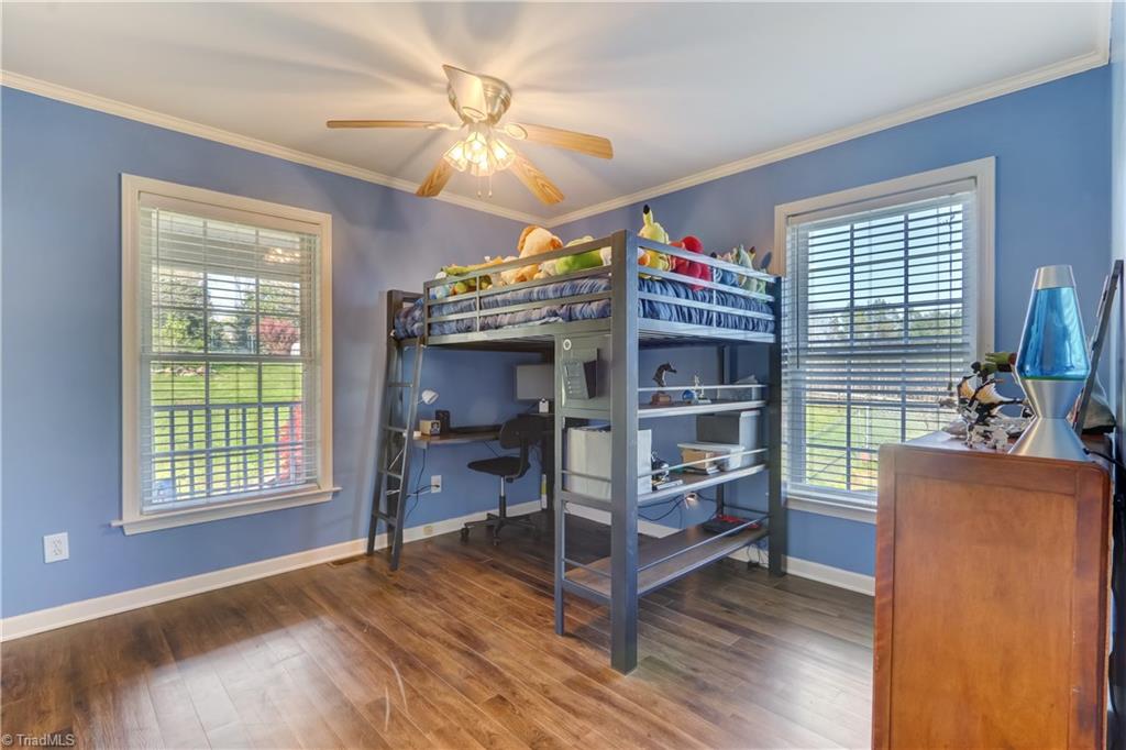 6010 Sandy Creek Church Road Staley, NC 27355 - Photo 17 of 38 Second bedroom with more property views