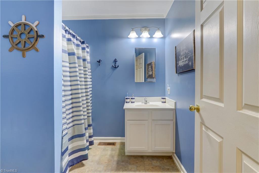6010 Sandy Creek Church Road Staley, NC 27355 - Photo 18 of 38 Second bathroom
