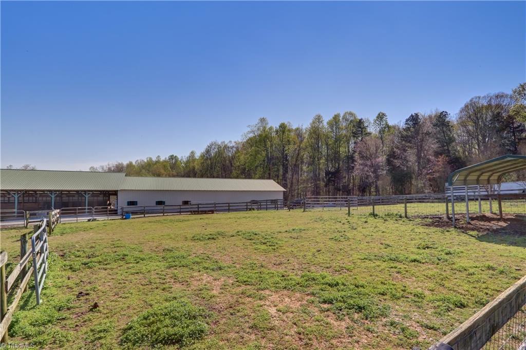 6010 Sandy Creek Church Road Staley, NC 27355 - Photo 24 of 38 One of the many pastures with run ins