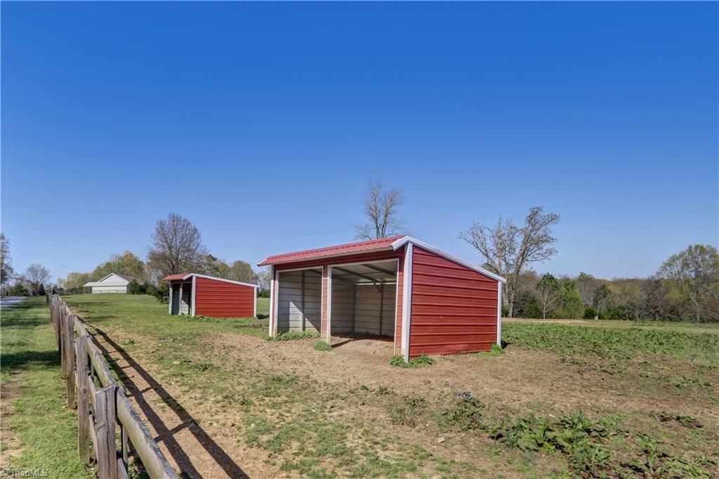 6010 Sandy Creek Church Road Staley, NC 27355 - Photo 25 of 38 Pasture run-ins
